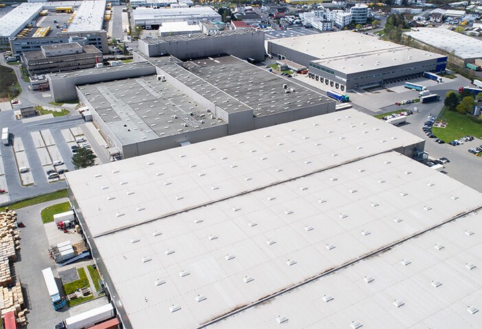 business with a new flat roof installed by our commercial roofers