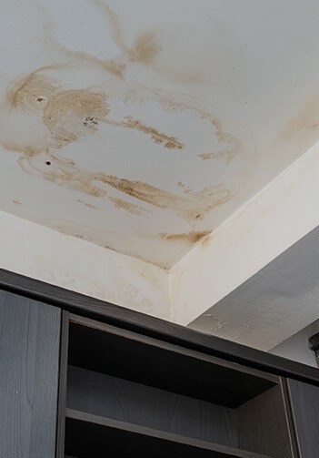checking for water intrusion during roof inspection in west palm beach