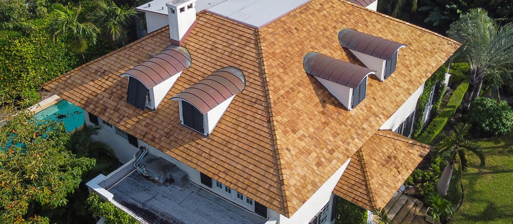home getting free estimate on cedar shake roofing in west palm beach