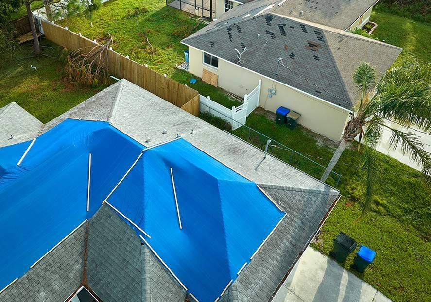 Roof in the process of emergency roof repair