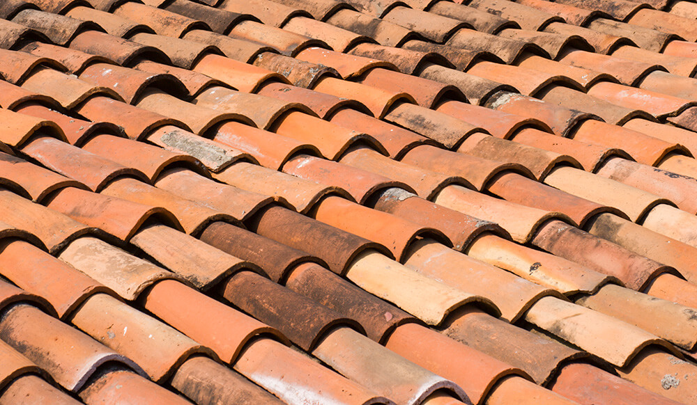 home showing signs of needing roof replacement in west palm beach